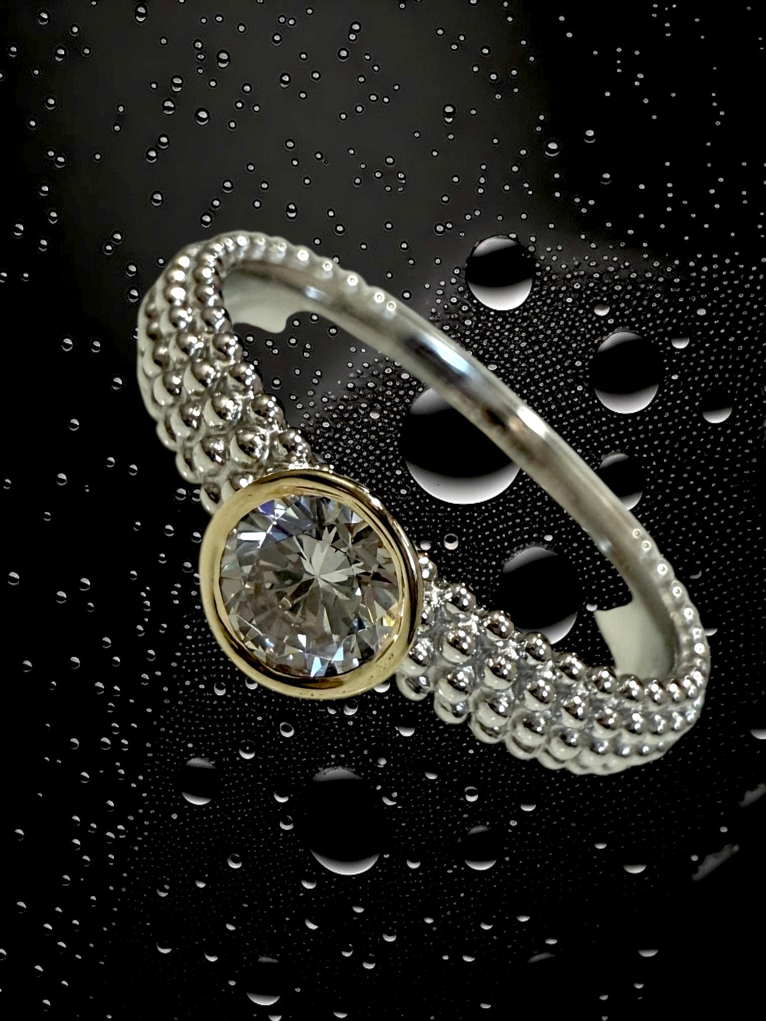 Solitaire Ring in Silver and Gold