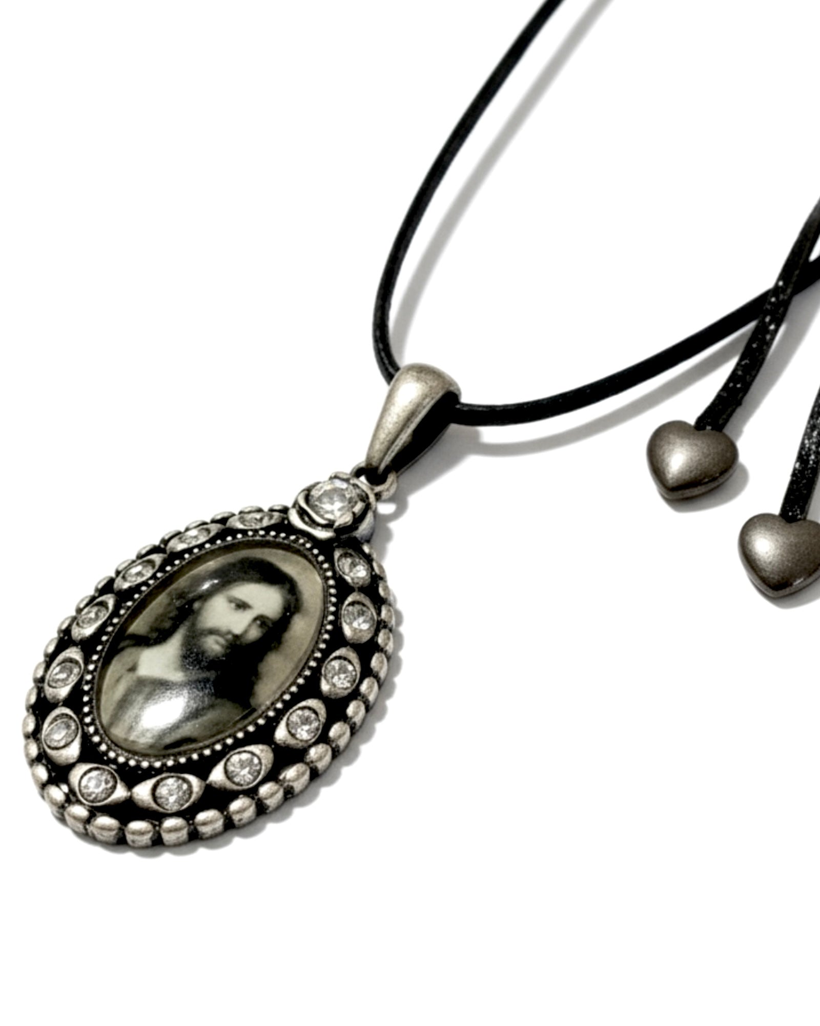 Silver necklace with image of Jesus.