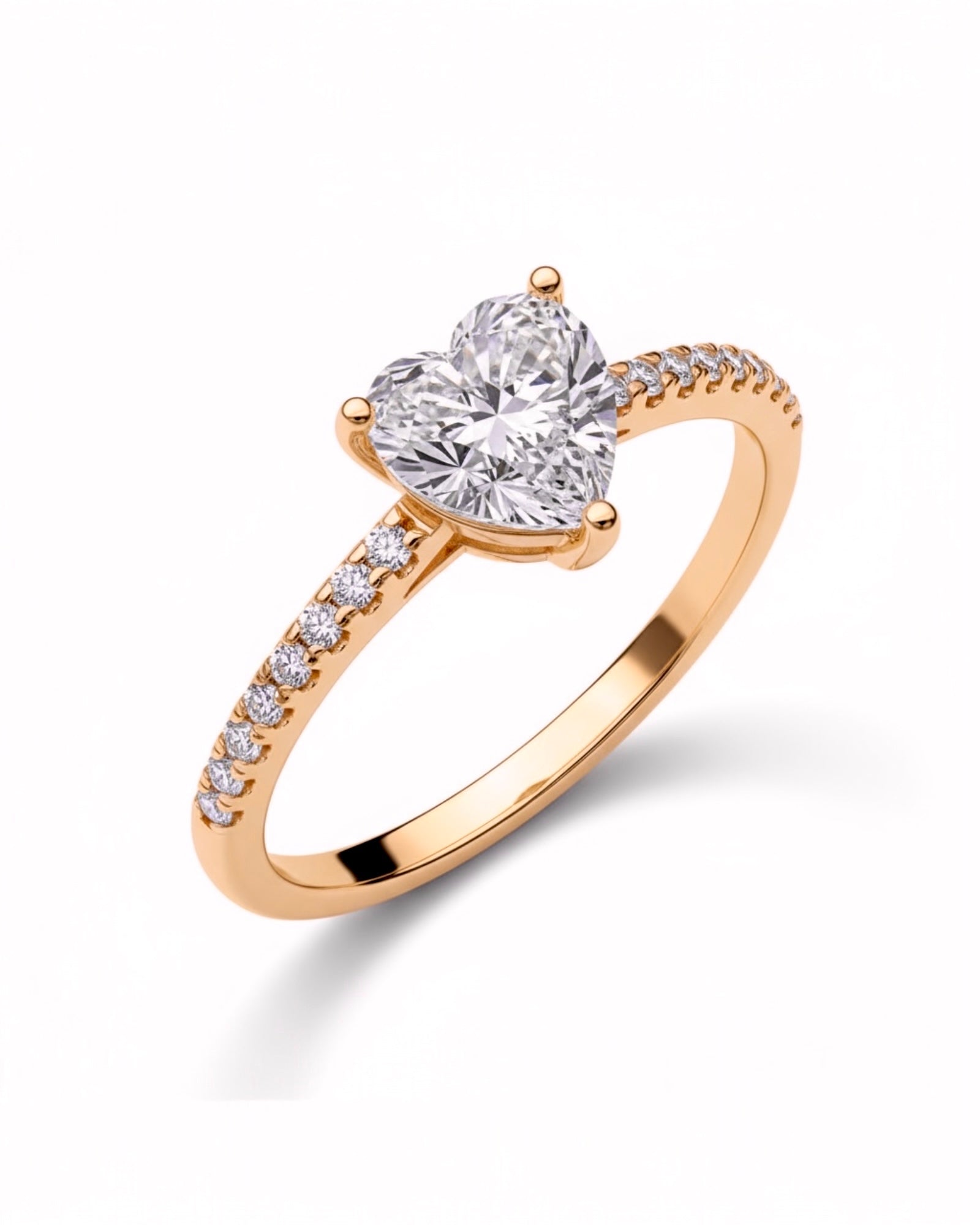 Rose gold silver ring with heart-shaped stone.