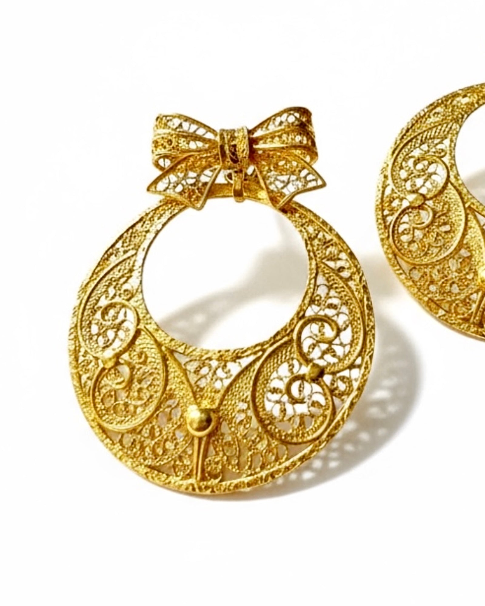 Gold-plated silver filigree bow earrings