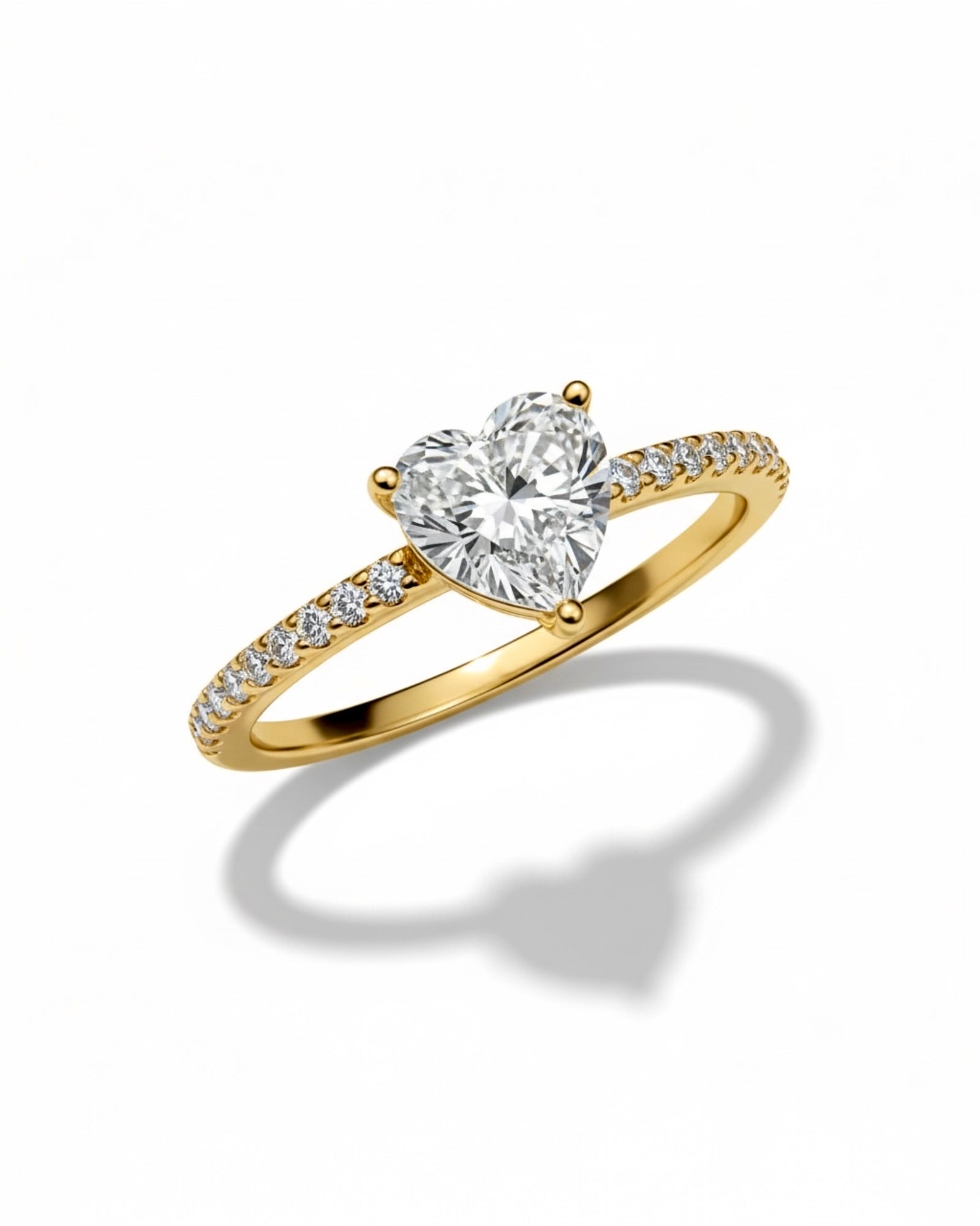 Gold-plated silver ring with heart-shaped stone.