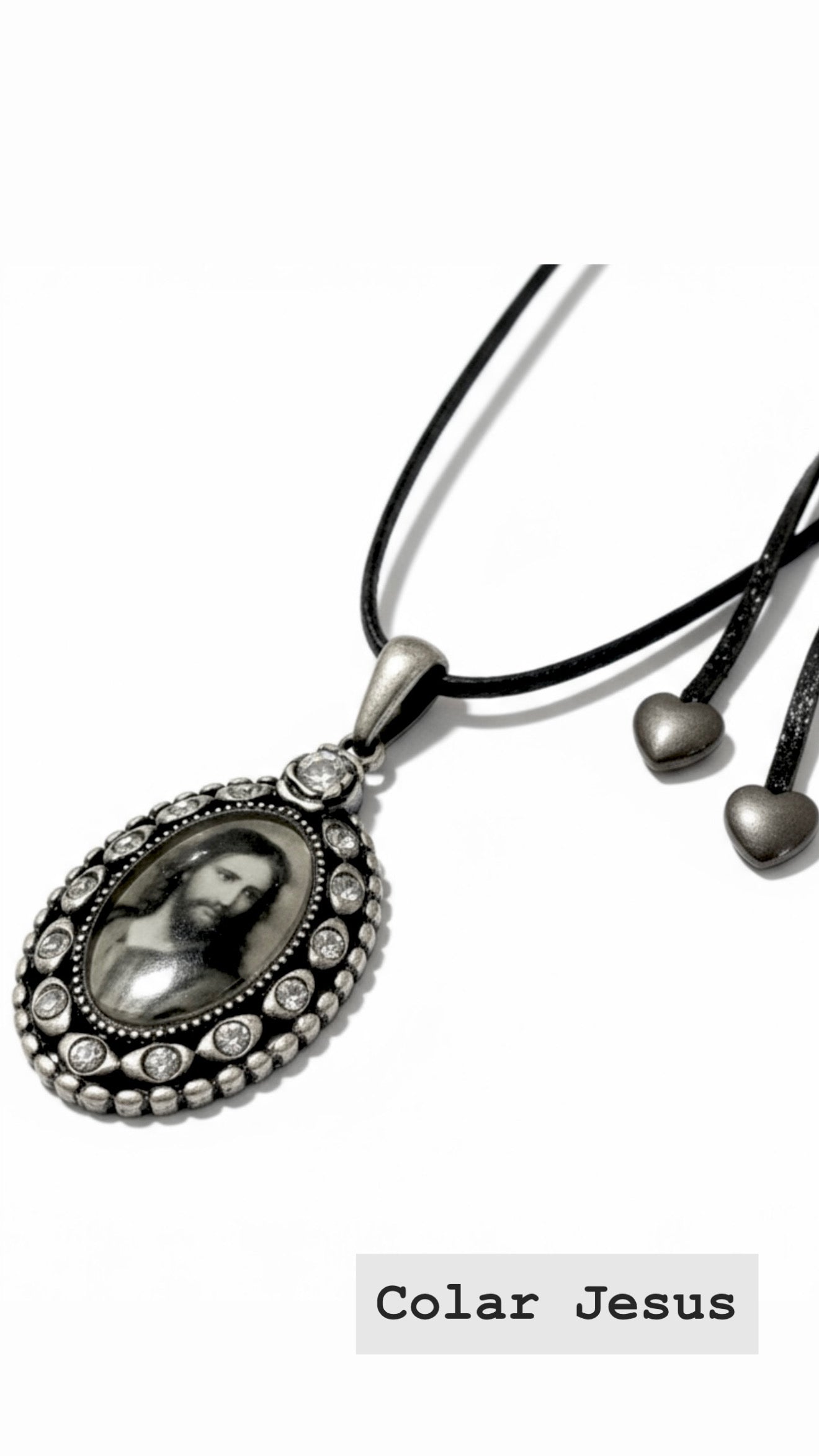 Silver necklace with image of Jesus.