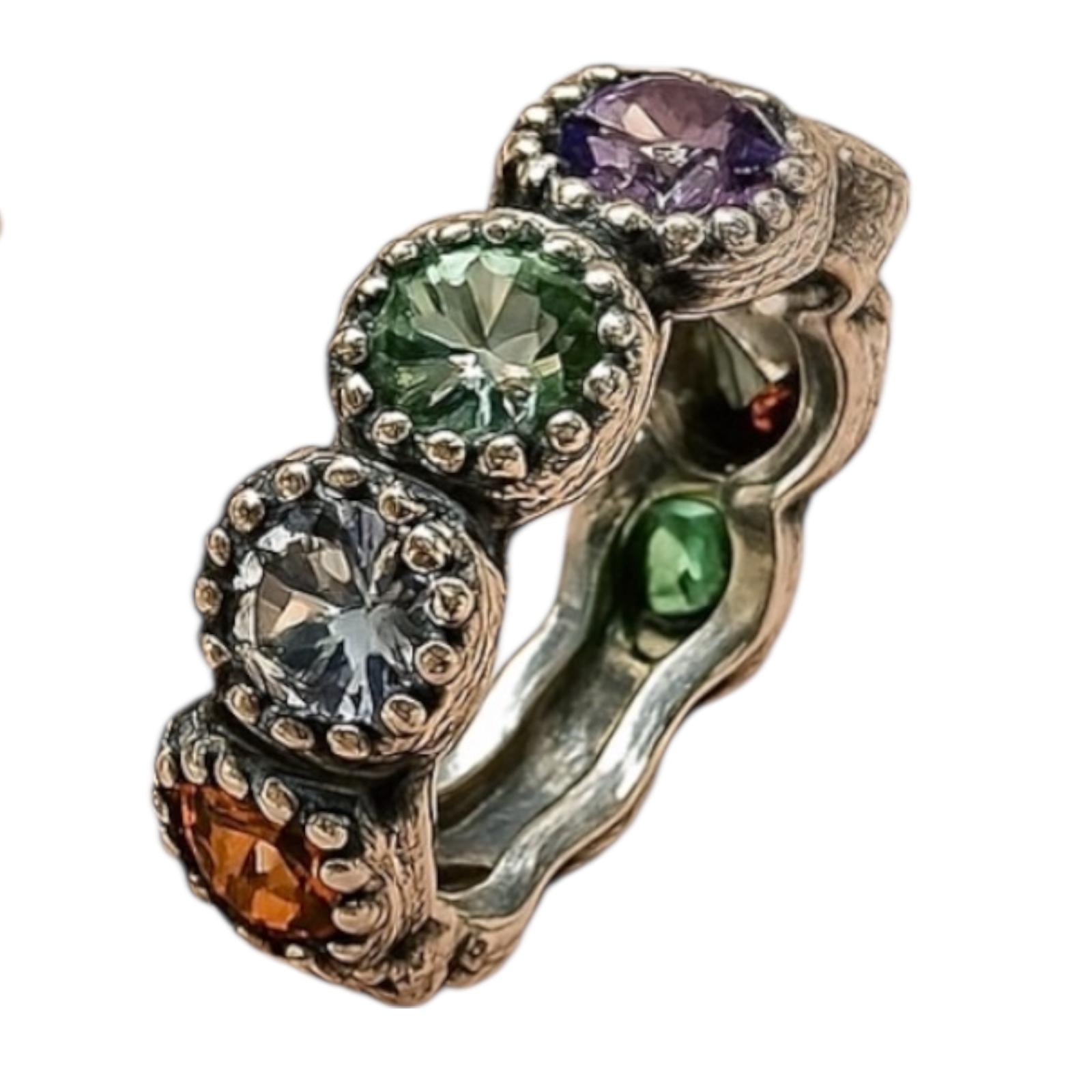 Silver and gold ring with colored stones.