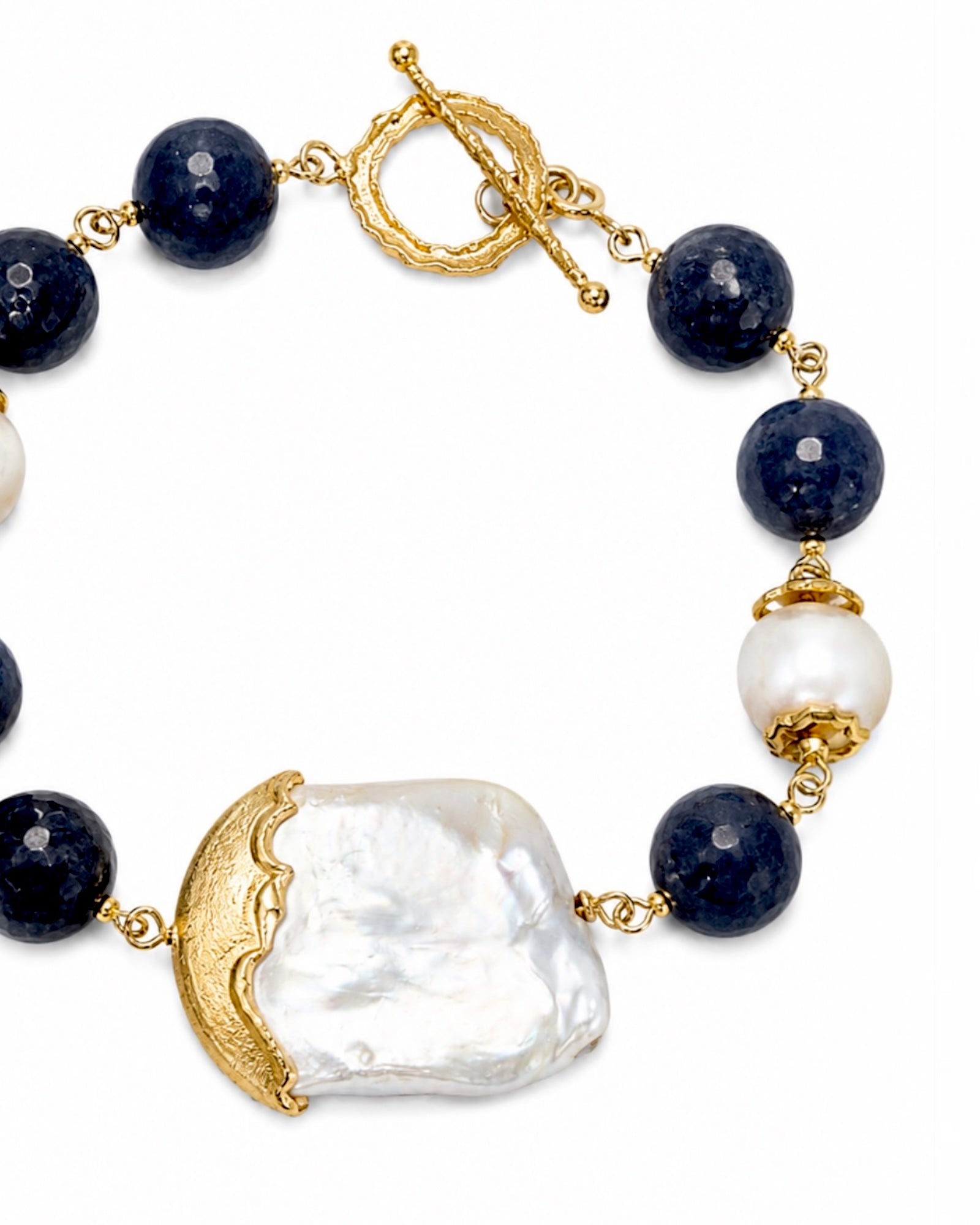 Gold-plated silver bracelet with round sparkle.