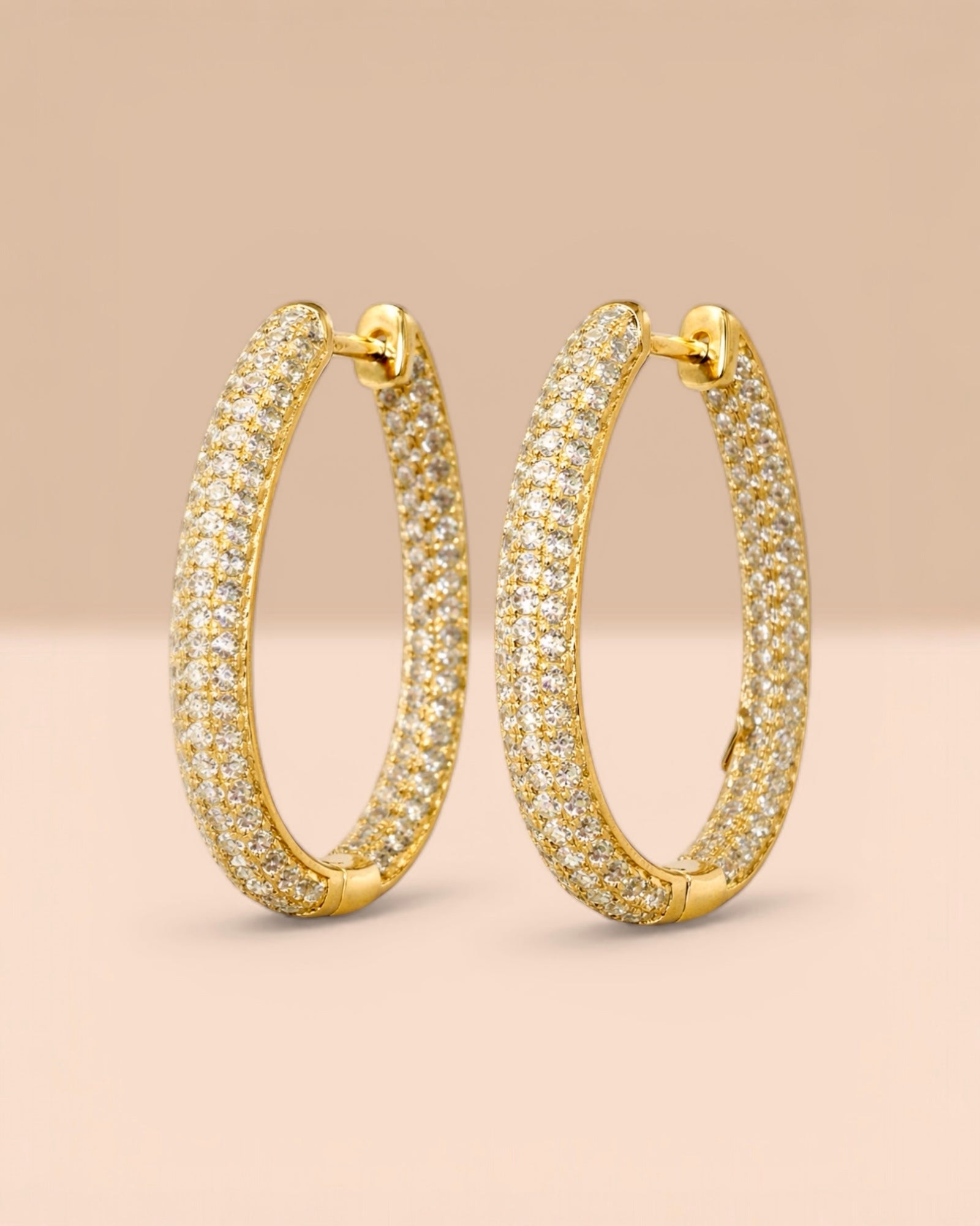 Brincos Argola Alongada em Prata Dourada