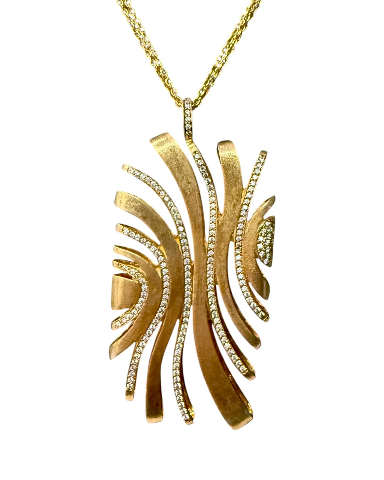 Colar Dourado com Pendente em Linhas Onduladas e Brilho