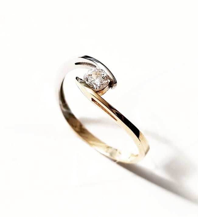 Solitaire Engagement Ring in White and Yellow Gold