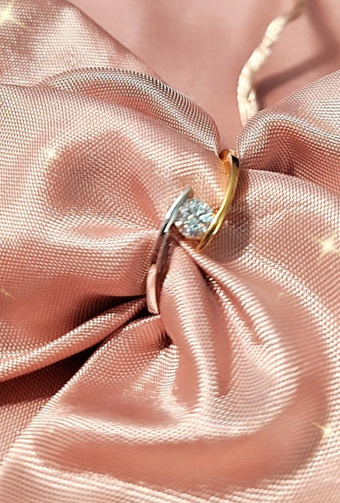 Solitaire Engagement Ring in White and Yellow Gold