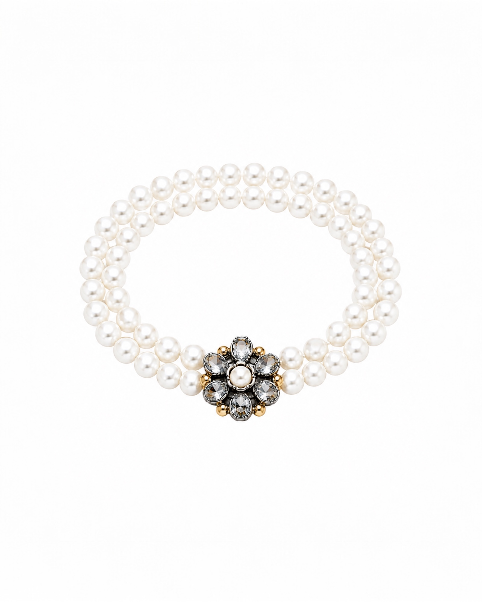 Pearl bracelet with flower in silver and gold.