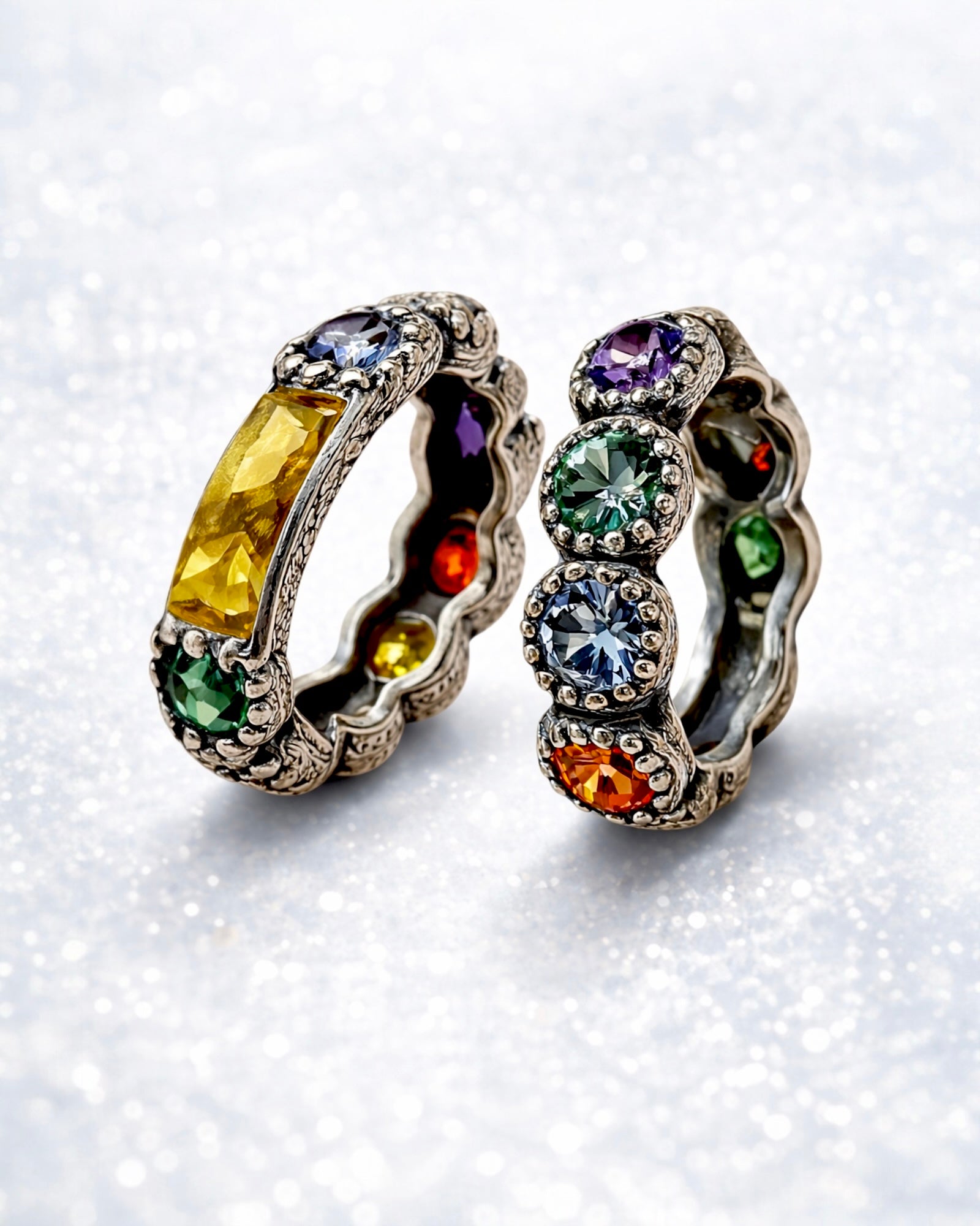 Silver and gold ring with colored stones.