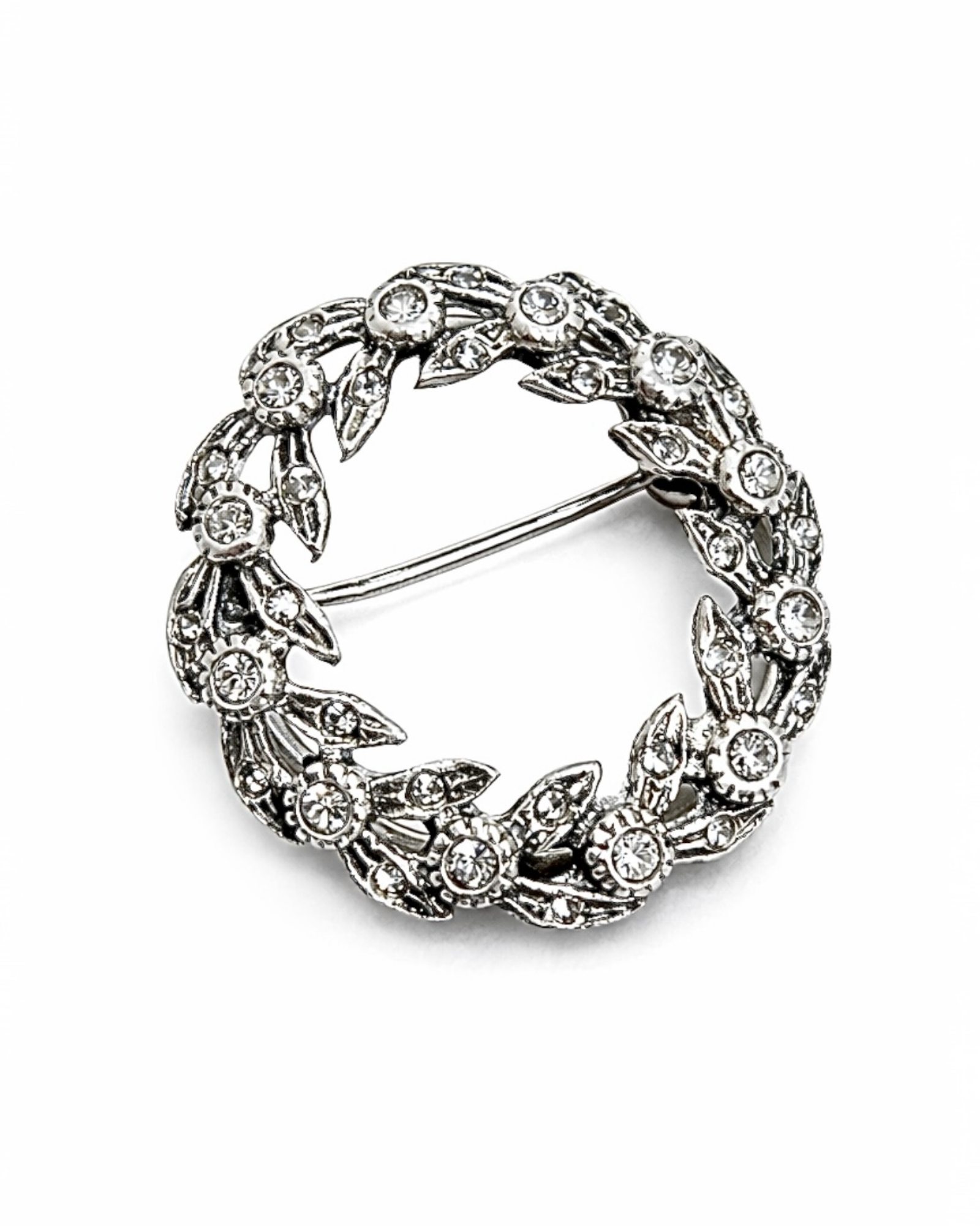 Cat eye pin with marcasite in silver.