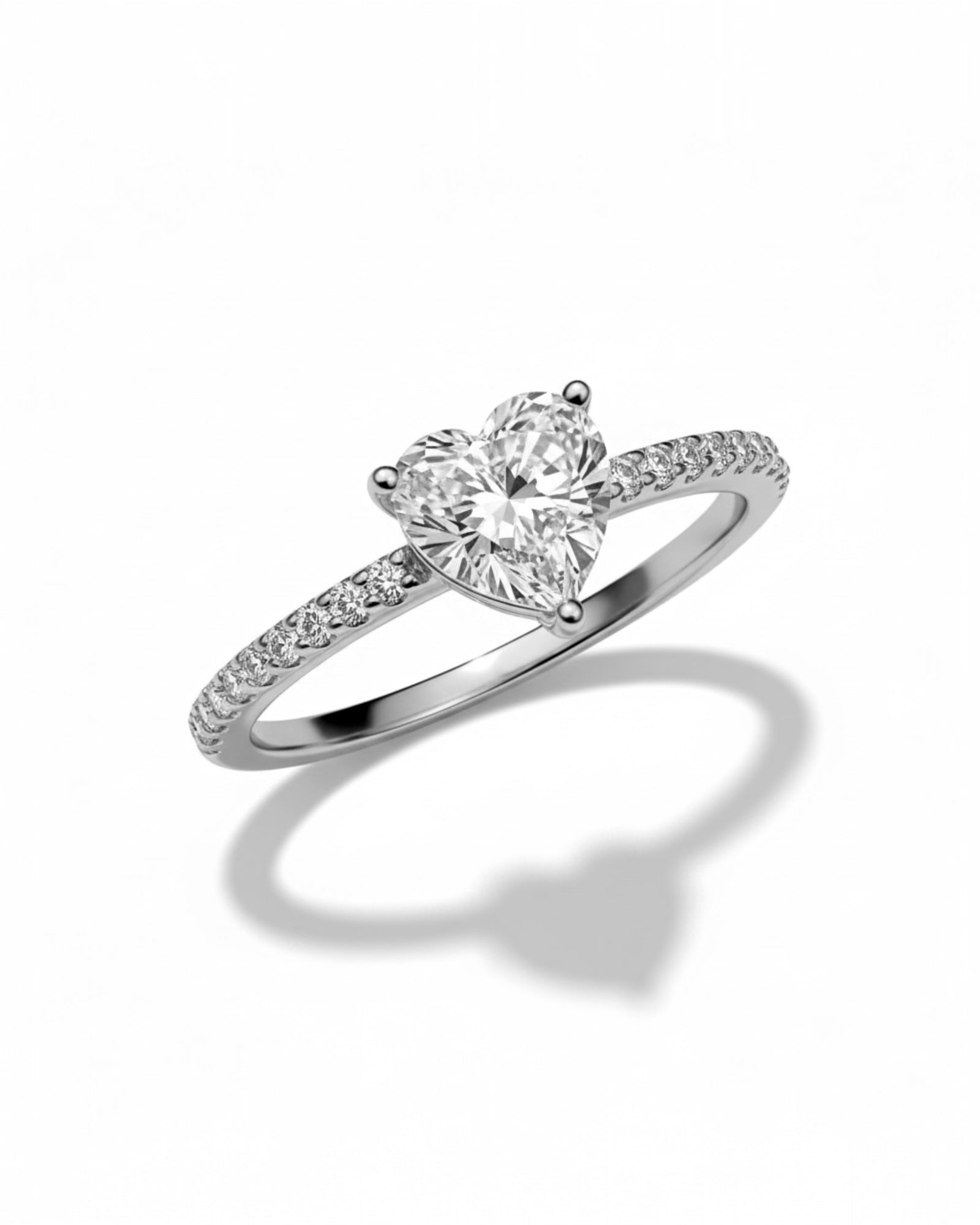 Silver ring with heart-shaped stone.