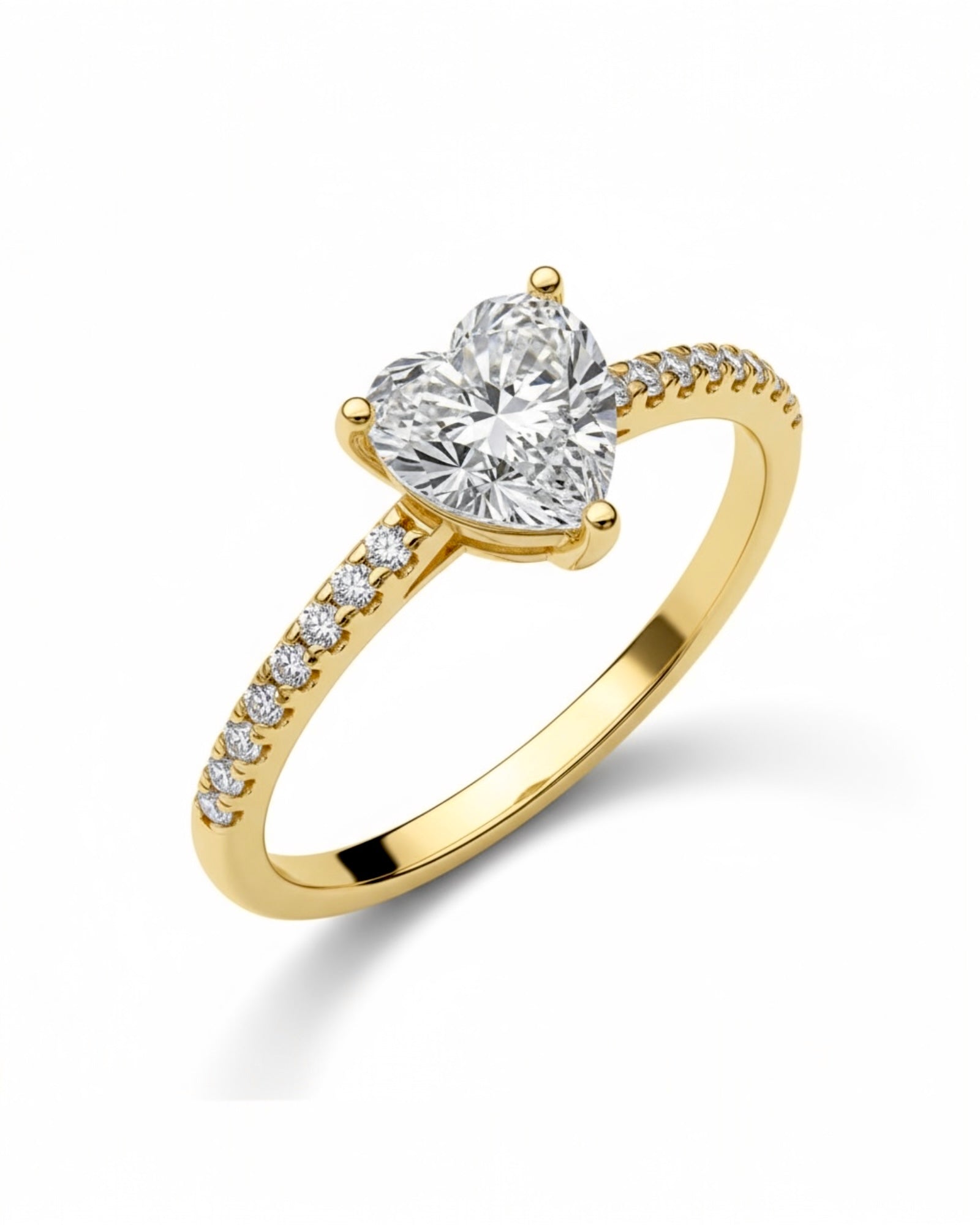 Gold-plated silver ring with heart-shaped stone.