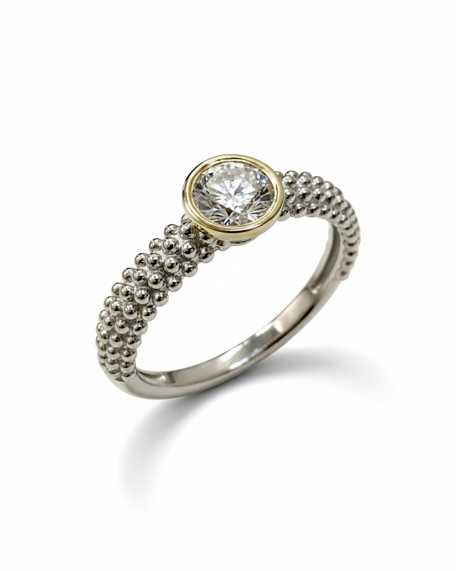 Solitaire Ring in Silver and Gold