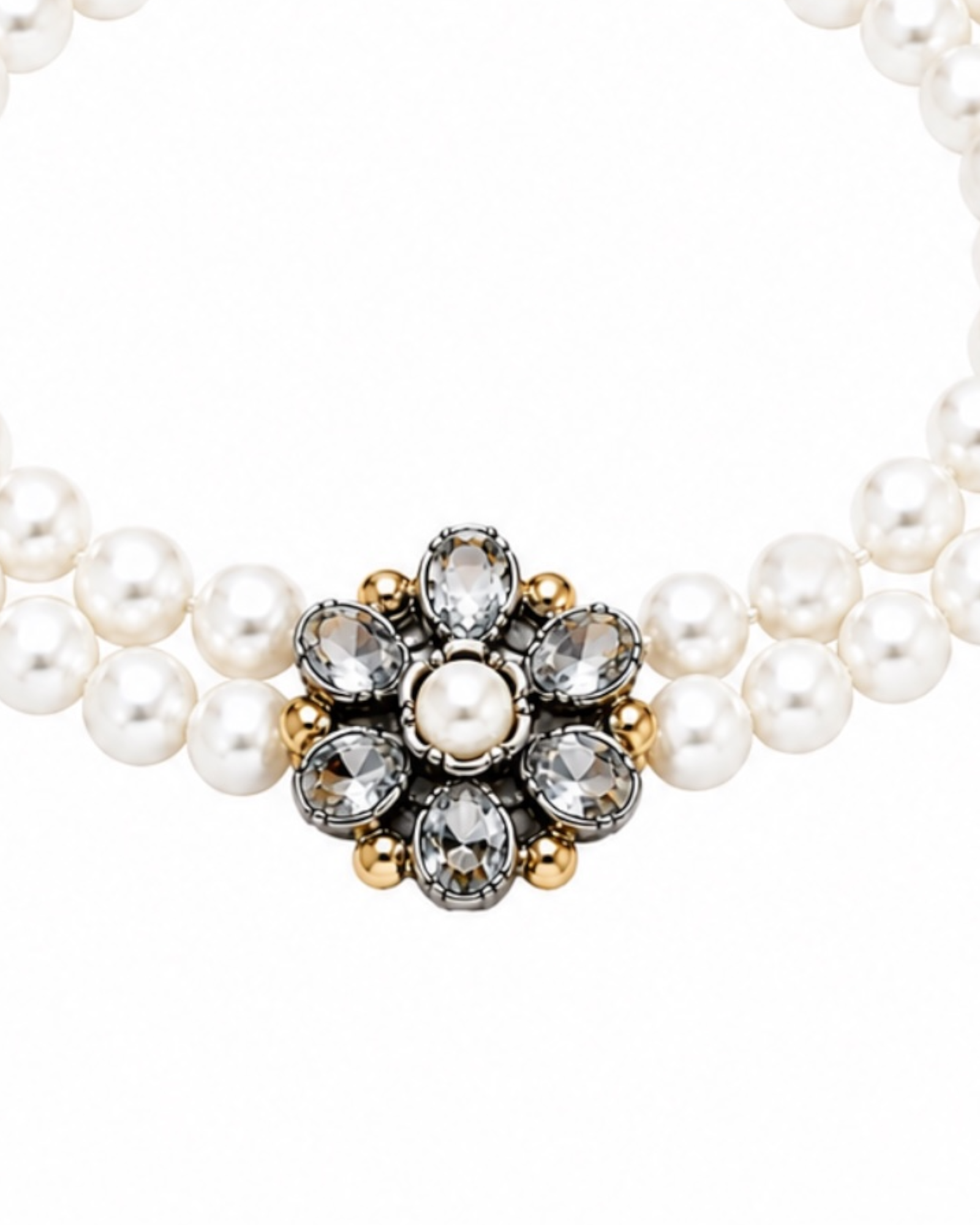 Pearl bracelet with flower in silver and gold.
