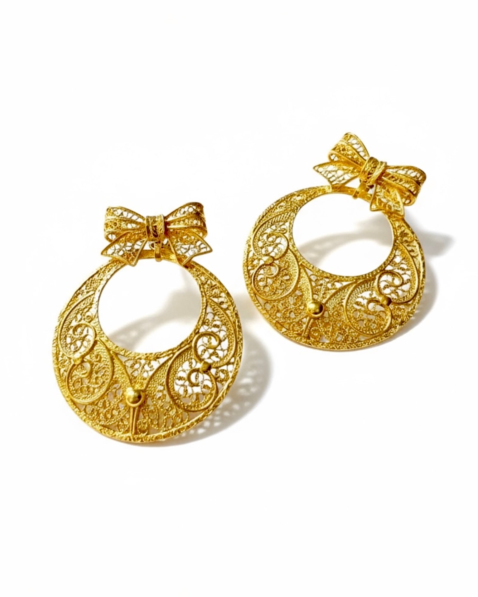 Gold-plated silver filigree bow earrings