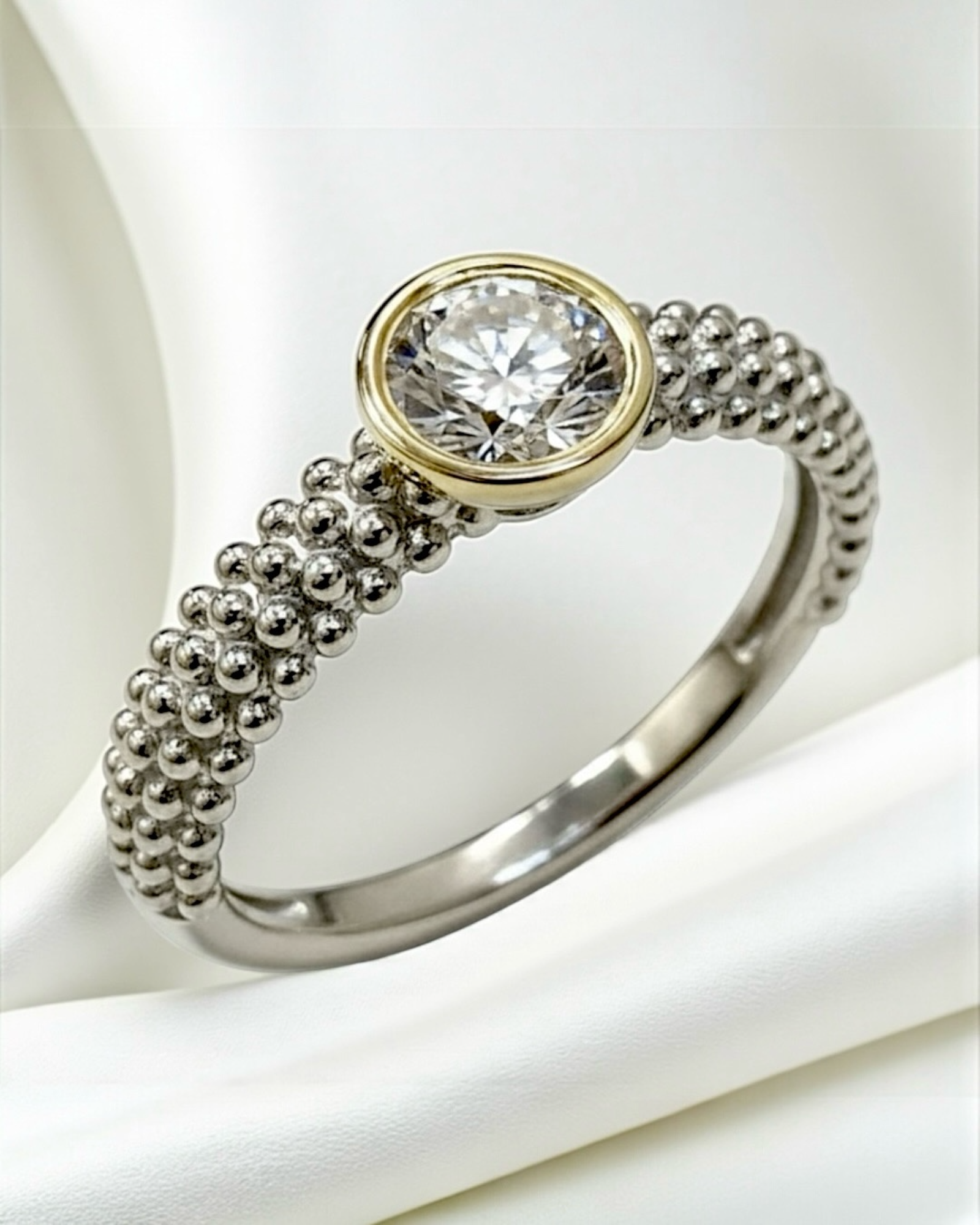 Solitaire Ring in Silver and Gold