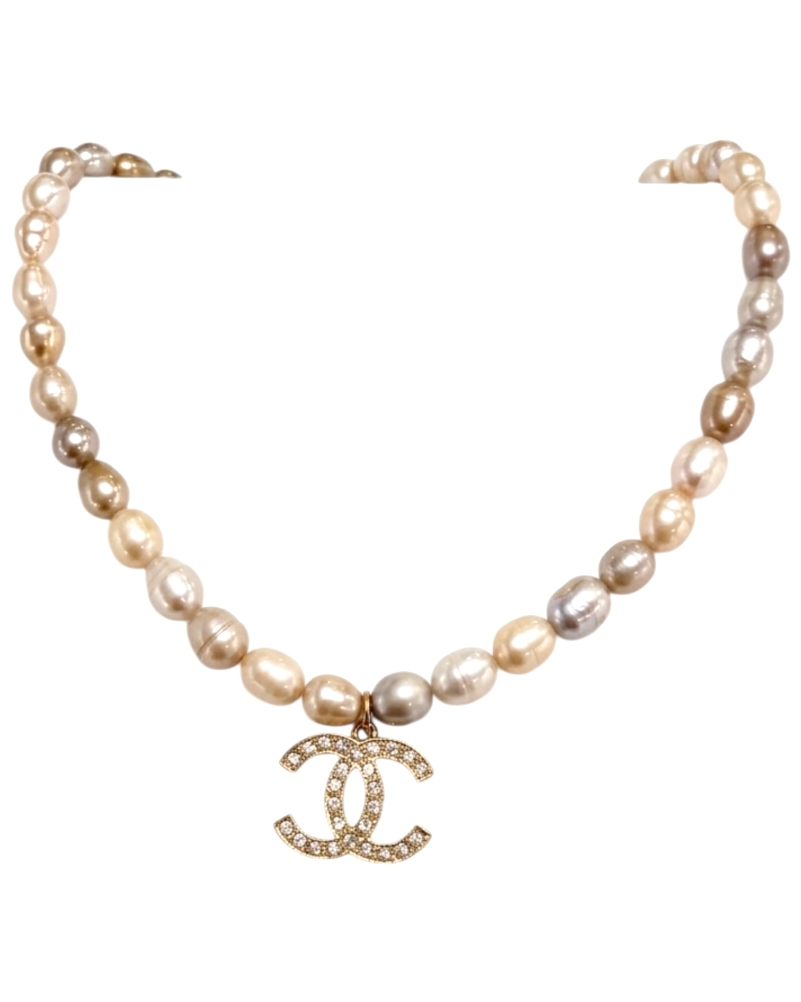 Charm necklace with pearls in gold-plated silver.