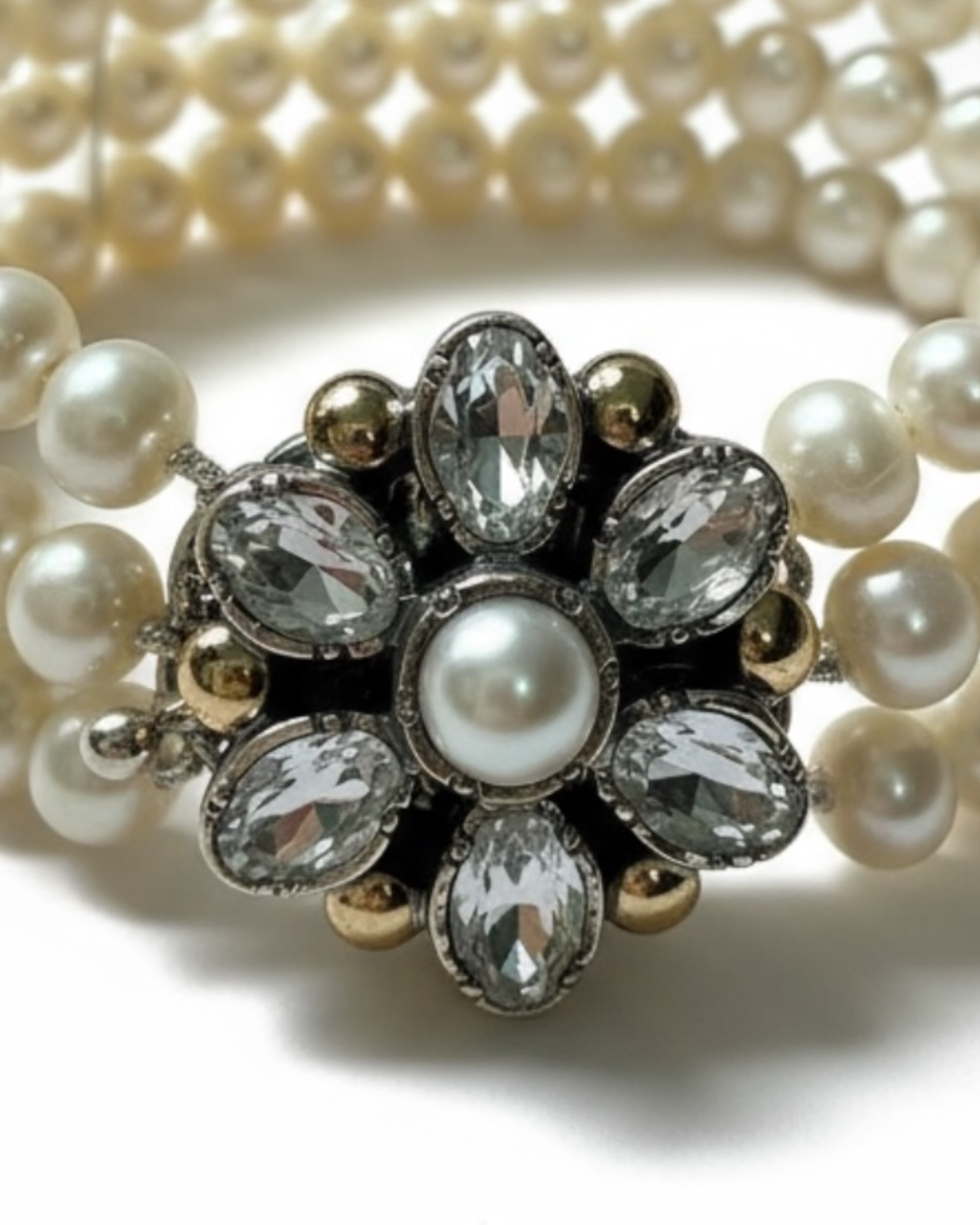 Pulseira de Pérolas com Flor em Prata e Ouro