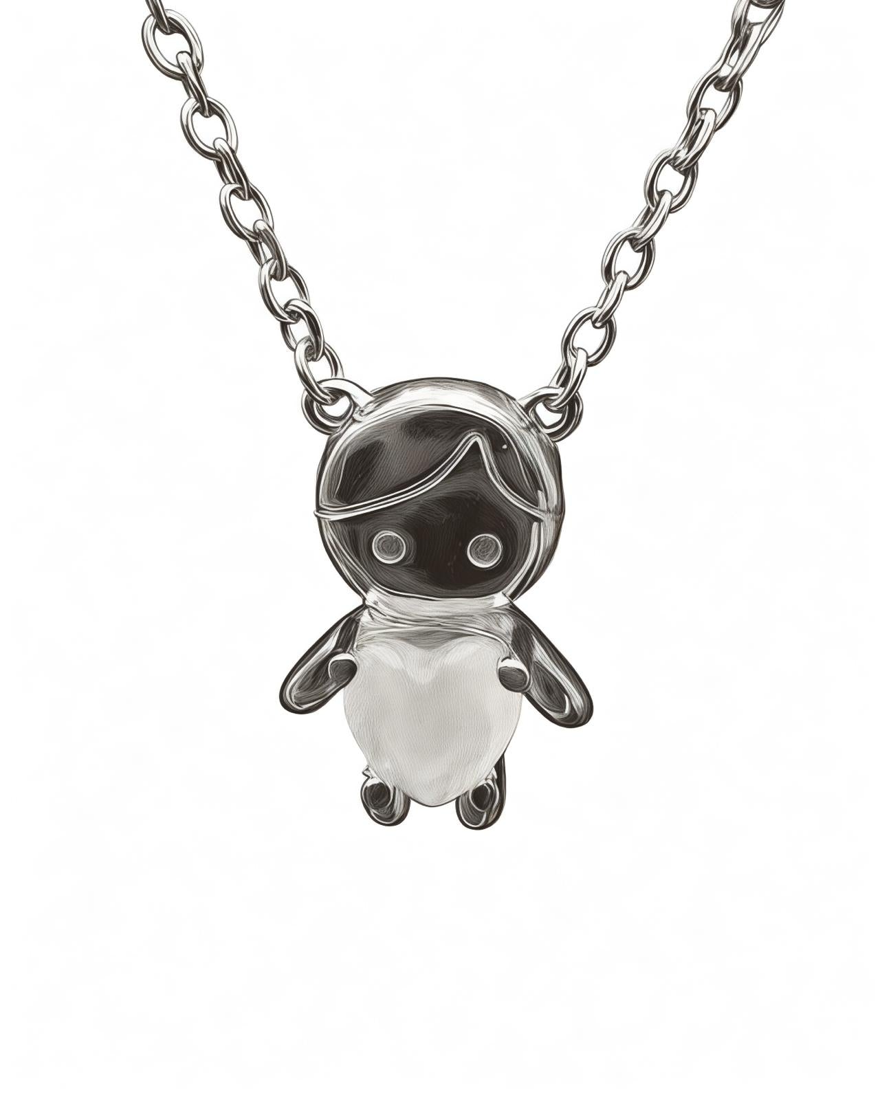 Silver necklace with boy charm and white heart.