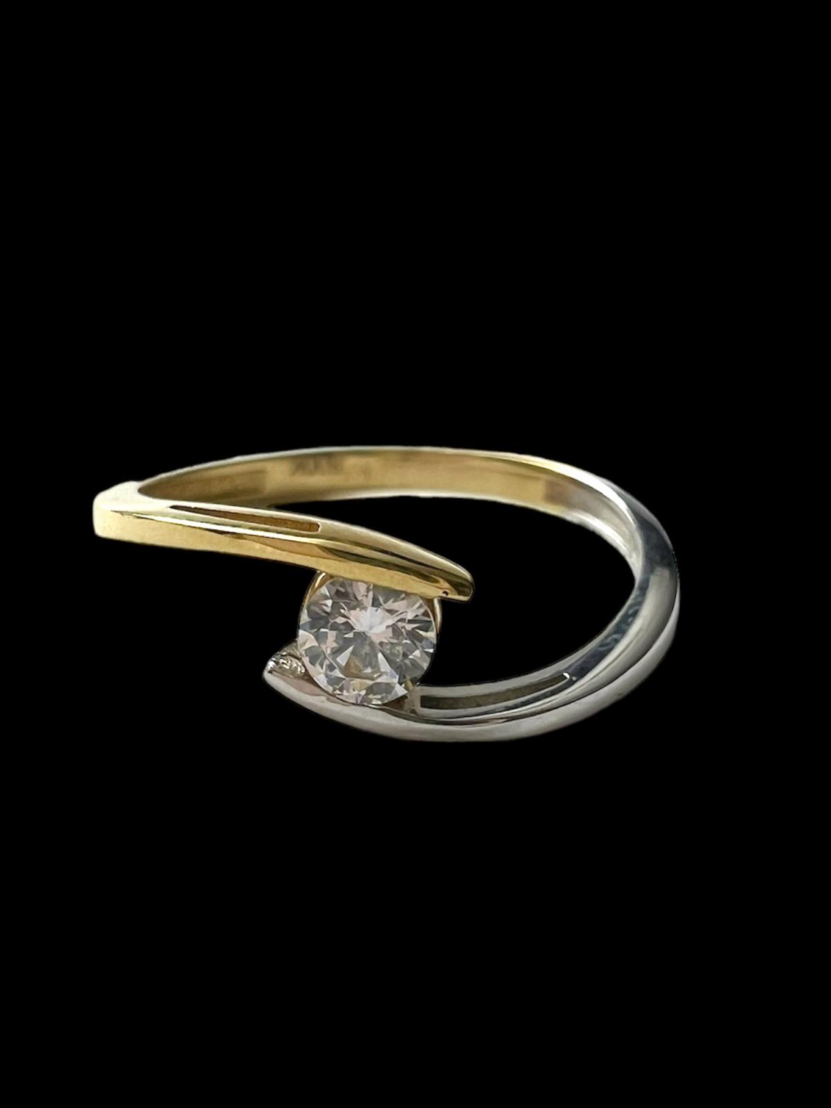 Solitaire Engagement Ring in White and Yellow Gold