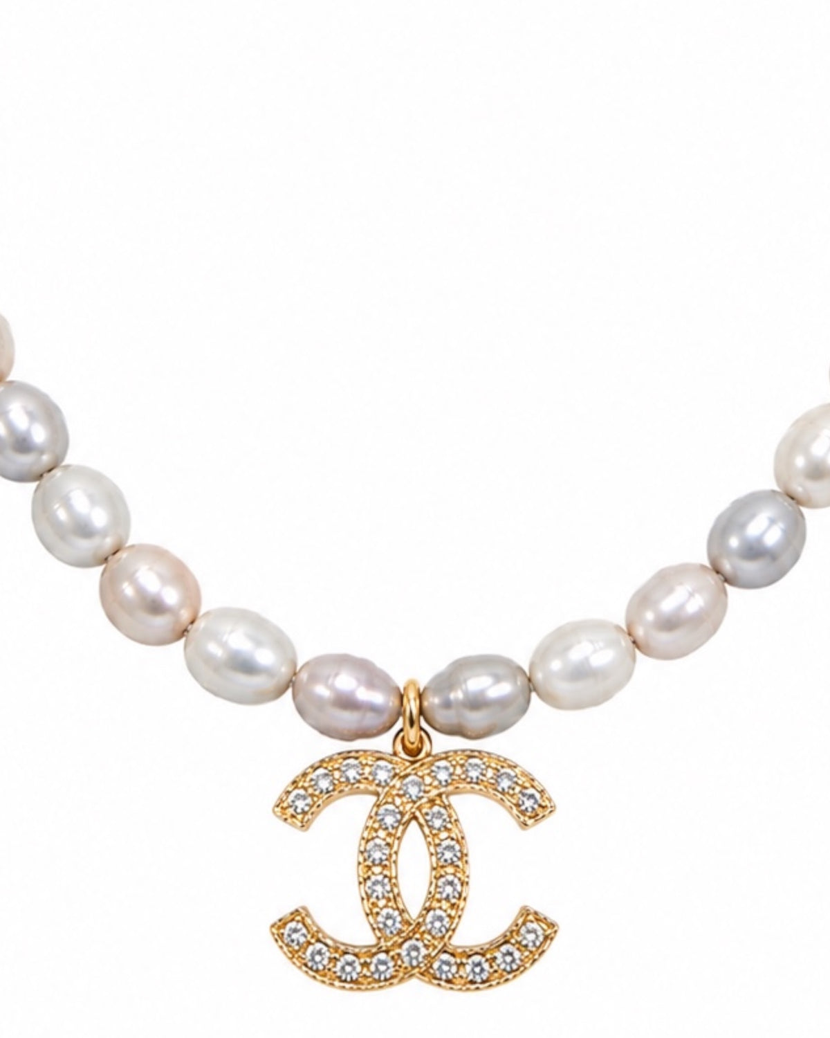 Charm necklace with pearls in gold-plated silver.